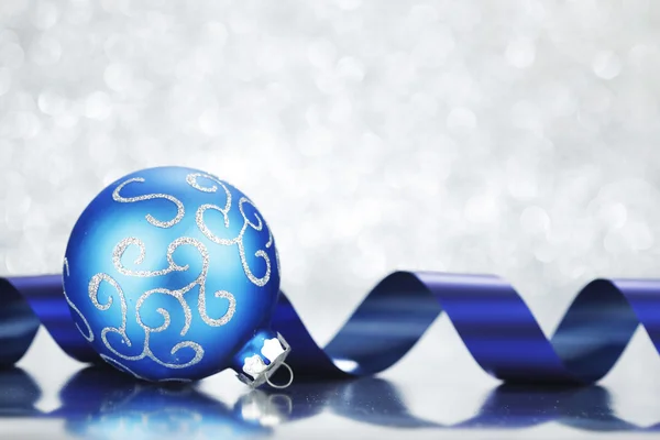 Christmas ball and ribbon — Stock Photo, Image