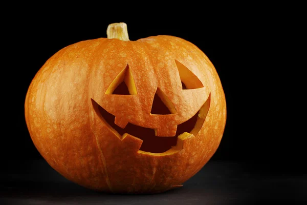 Illuminated cute halloween pumpkin — Stock Photo, Image