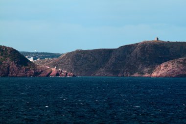 Shoreline of approach to St. John?s Harbor. clipart