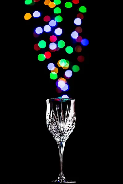 Burbujas de luz saliendo de una copa de vino — Foto de Stock