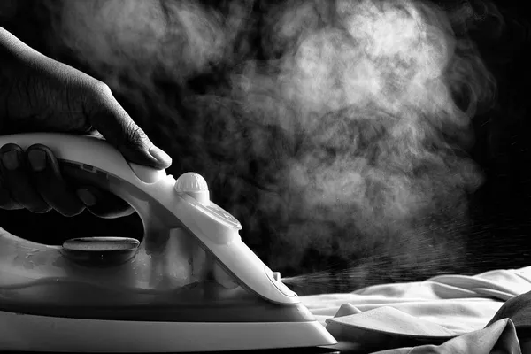 Ironing a shirt — Stock Photo, Image