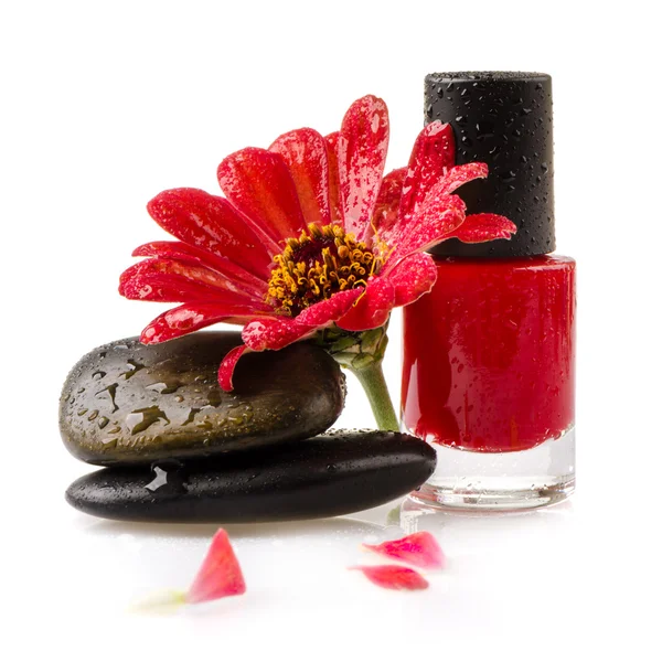 Nagellack mit Blume auf weißem Hintergrund — Stockfoto