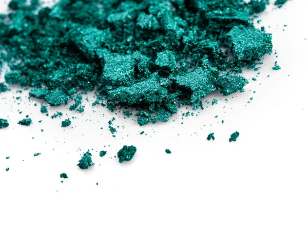 Crushed green eye shadow on white background — Stock Photo, Image