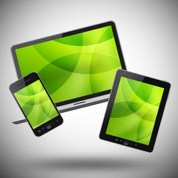 Tablet PC, teléfono móvil y portátil sobre fondo gris — Foto de Stock