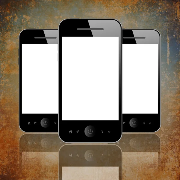 Телефоны на коричневом — стоковое фото