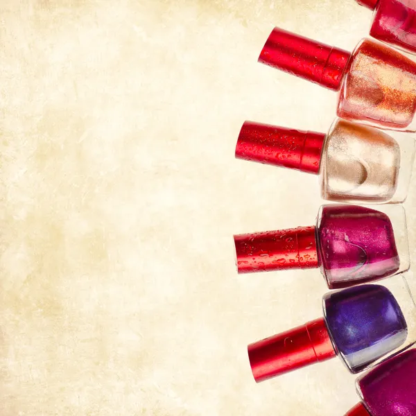 Nail polish over vintage background — Stock Photo, Image