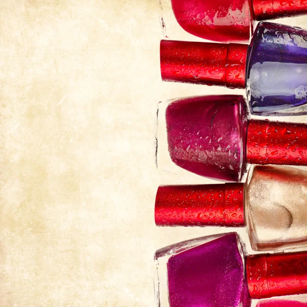 Nail polish over vintage background — Stock Photo, Image