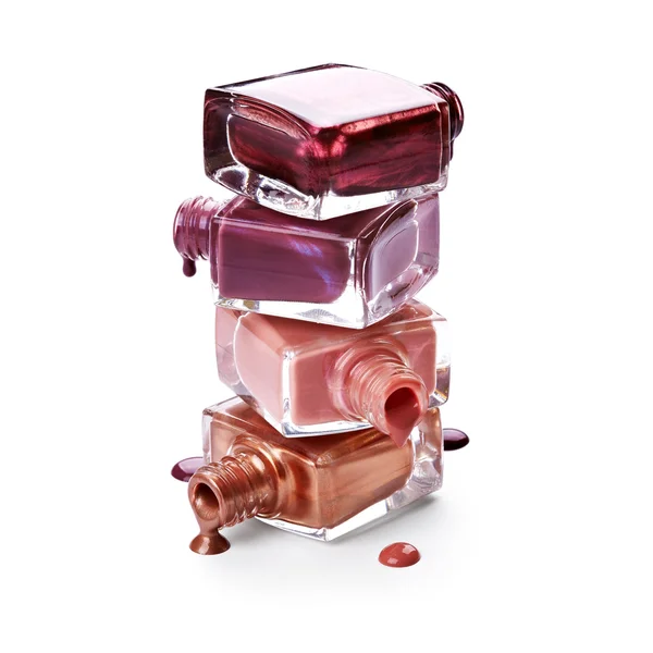 Bottles with spilled nail polish — Stock Photo, Image