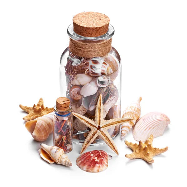 Seashells com garrafa — Fotografia de Stock