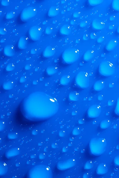 Macro Shot Drops Water Blue Flat Surface Abstract Blue Background — Stock Photo, Image