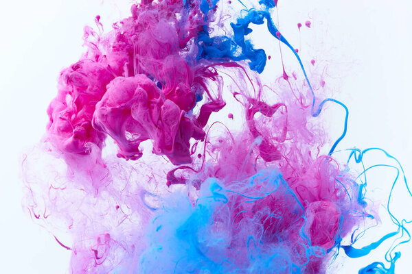 Creative dynamic abstract background with flowing splash of paint in water