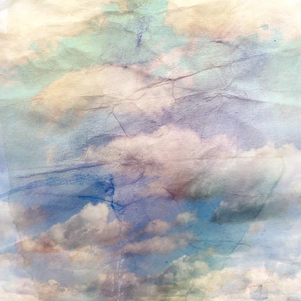 Old crumpled background with clouds — Stock Photo, Image