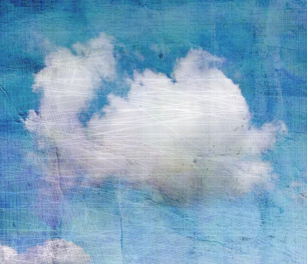 Старый скомканный фон с облаками — стоковое фото