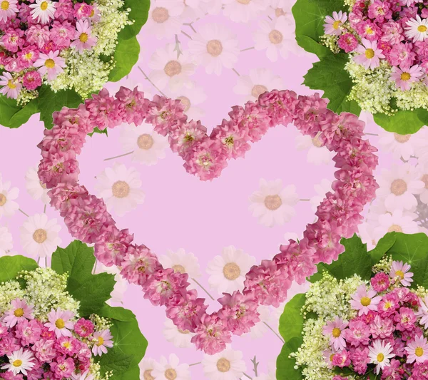 Lovely floral arrangement in the shape of heart from pink roses — Stock Photo, Image