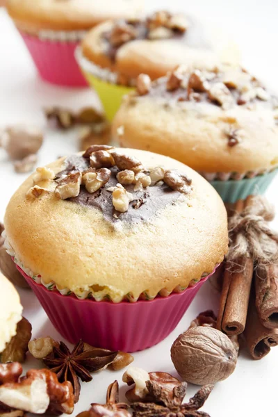 Muffins in colorful forms — Stock Photo, Image