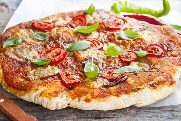 Pizza with salami and basil homemade — Stock Photo, Image