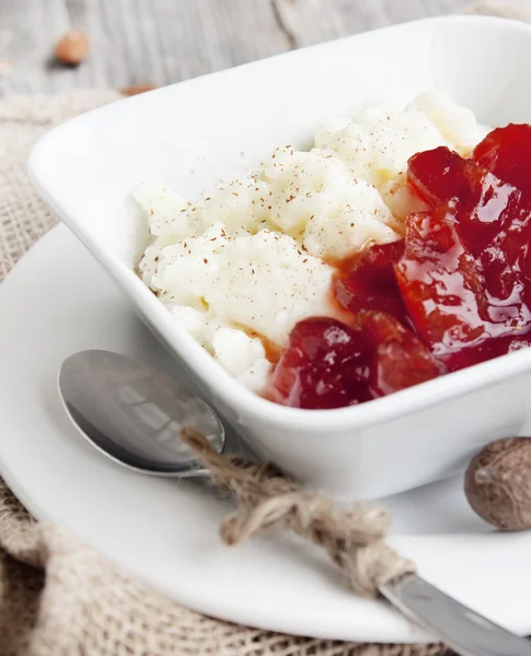 Rice pudding with jam — Stock Photo, Image