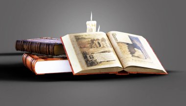 Kitaplar açık ve mum resimlemesi ile istiflenmiş