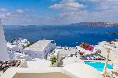 Europe summer destination. Traveling concept, sunny scenic famous landscape of Santorini island, Oia, Greece. Caldera sea view, blue sunny sky dream cityscape. Vacation panorama, amazing outdoor scene