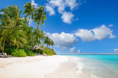 Panoramic landscape view of white beach sand sea water and blue sky clear background. 