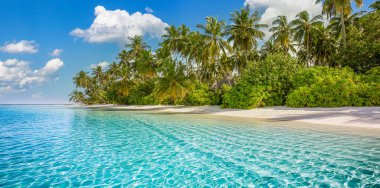 Panoramic landscape view of white beach sand sea water and blue sky clear background. 