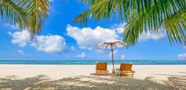 Panoramic landscape view of white beach sand sea water and blue sky clear background. 