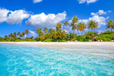 Panoramic landscape view of white beach sand sea water and blue sky clear background. 