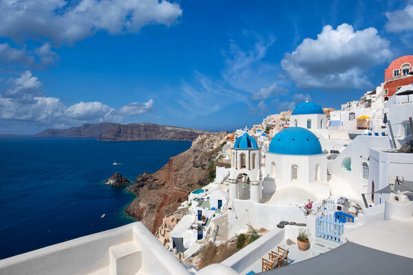 Europe summer destination. Traveling concept, sunny scenic famous landscape of Santorini island, Oia, Greece. Caldera sea view, blue sunny sky dream cityscape. Vacation panorama, amazing outdoor scene