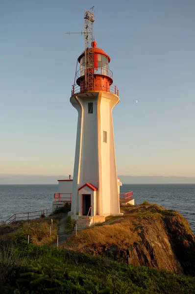 Deniz feneri günbatımı — Stok fotoğraf