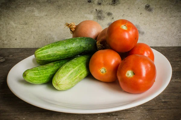 Cebolas de pepinos e tomates — Fotografia de Stock