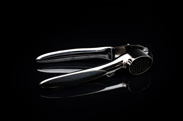 Stainless steel Garlic press — Stock Photo, Image