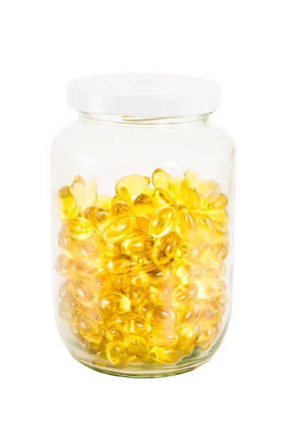 Soft gel capsule in glass bottle — Stock Photo, Image