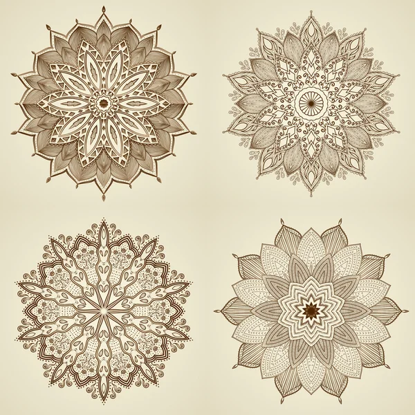 Conjunto de quatro mandalas. Lindas flores . — Vetor de Stock