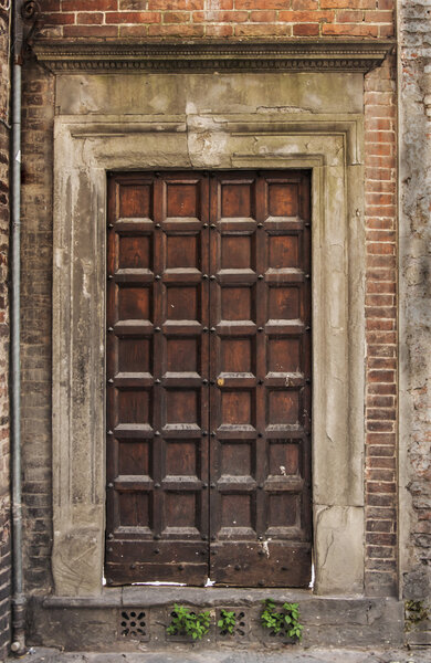 Italian door in small village, Italy