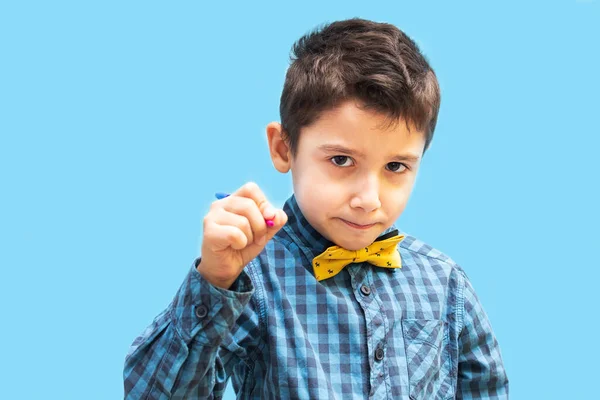 Boy Holds Pen His Hand Portrait Schoolboy Blue Background — Stock Photo, Image
