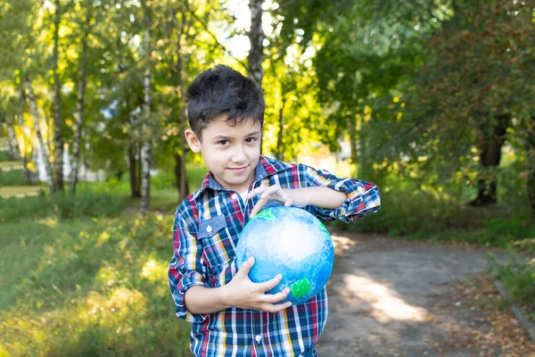Positive Boy Holds Globe His Hands Outdoors — Stock Photo, Image