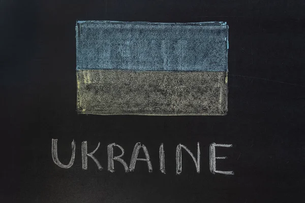 Tahtaya tebeşirle yazılmış 