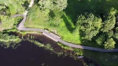 Pedestrians path by the Dam, which is called Plungs Jra (Plung sea).Lithuania.