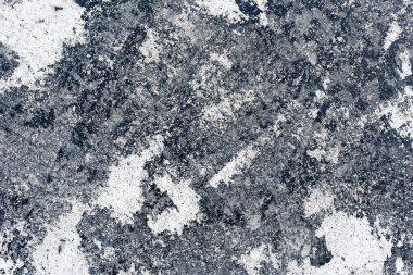 Grunge abstract background. Dirt textured surface. List of roofing felt close-up.
