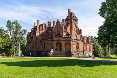 Tukums, Latvia 14 August 2022: Old Castle manor in Latvia - Jaunmoku pils  view during summer time