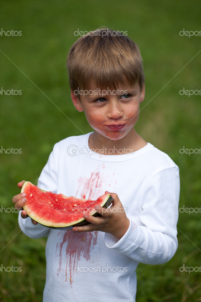 Child eating a watermelon