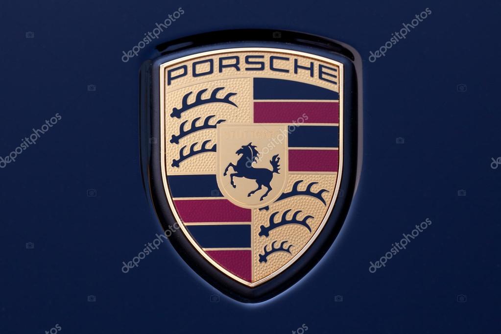 Stuttgart, Germany - September 4, 2012: Macro shot of the legendary Porsche emblem on a Porsche 911. Porsche is a German company with investments in the luxury autom