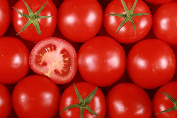 Tomaten bilden den Hintergrund — Stockfoto