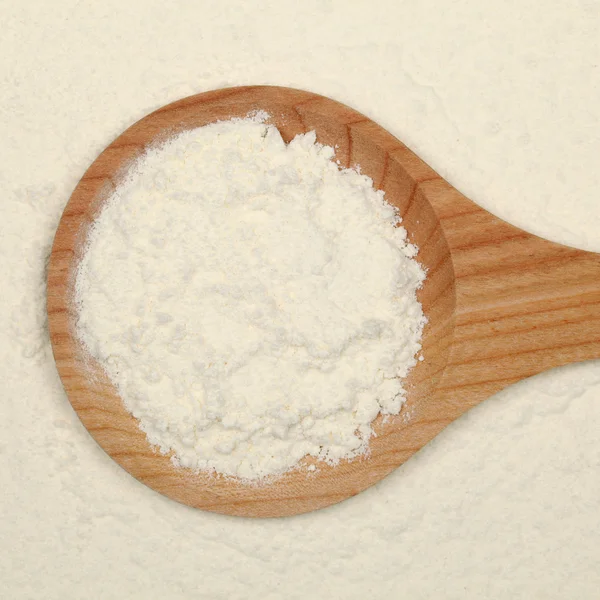 Baking: Flour on a spoon — Stock Photo, Image