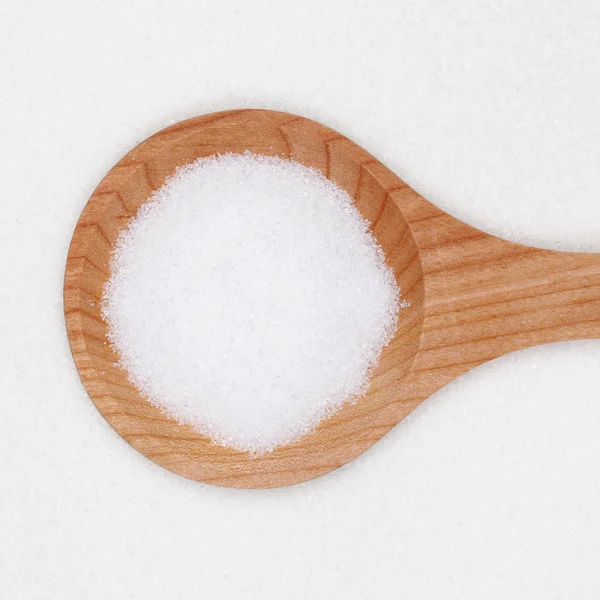 Sugar on a spoon — Stock Photo, Image