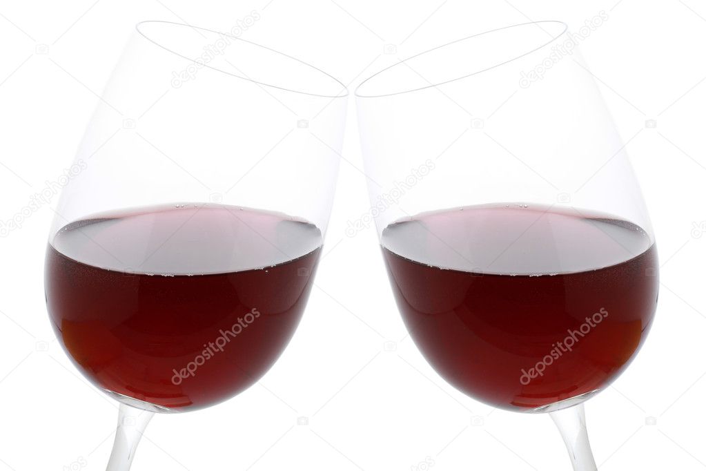 Clink glasses with red wine