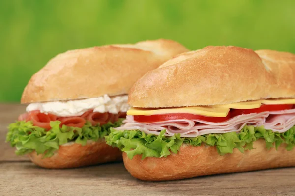 Sub Sandwiches with ham and salmon — Stock Photo, Image