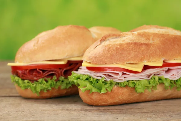 Sub Sandwiches with salami and ham — Stock Photo, Image