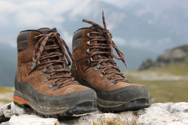 Hiking boots in the mountains Alps — Stock Photo, Image