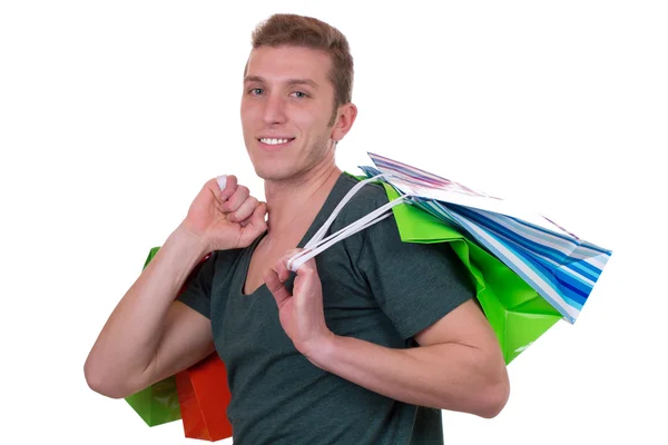 Joven comprando con bolsas de compras — Foto de Stock